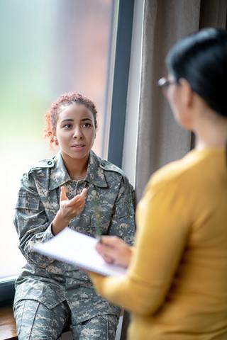 Soldier speaking to job counselor