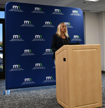 DLI Commissioner Kate Perushek at a news conference Sept. 10, 2026.