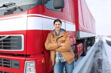 Woman near red truck